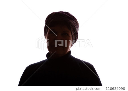 Dark silhouette of an elderly woman, pensioner in headdress - isolate Dark silhouette of an elderly woman, pensioner in headdress - isolate 118624098