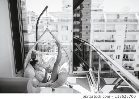 Discover the Chic Balcony Retreat Featuring a Stylish Hammock Chair for Ultimate Relaxation Discover the Chic Balcony Retreat Featuring a Stylish Hammock Chair for Ultimate Relaxation 118625700