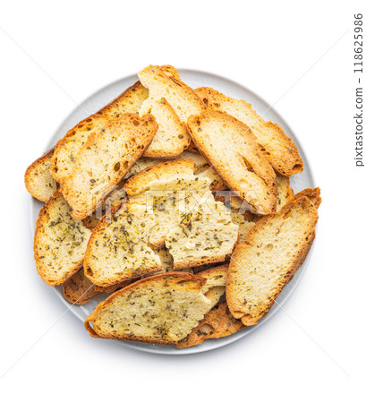 Crispy roasted bruschetta bread isolated on white background. Crispy roasted bruschetta bread isolated on white background. 118625986