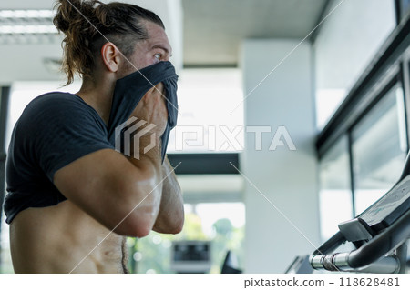 Close up Male feeling tired and sweaty face Close up Male feeling tired and sweaty face 118628481