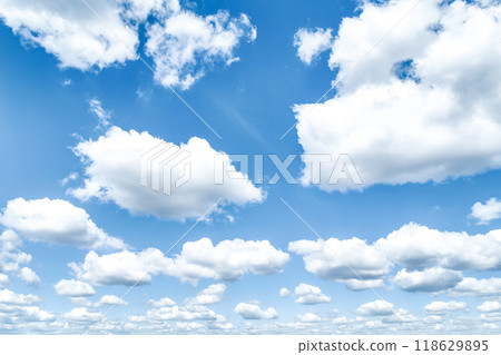 Beautiful blue sky and white cumulus clouds abstract background. Cloudscape background. Blue sky and fluffy white clouds on sunny days. Blue sky and daylight. World Ozone Day. Ozone layer. Summer sky. 118629895