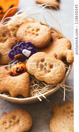 Homemade Halloween treats: pumpkin and ghost cookies Homemade Halloween treats: pumpkin and ghost cookies 118630345