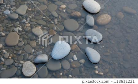 Smooth Stones on Calm Water Surface Smooth Stones on Calm Water Surface 118631221