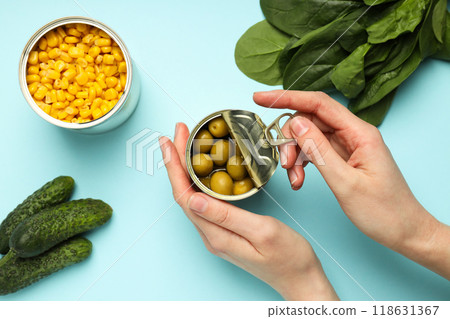 The process of opening a can, on a light background. The process of opening a can, on a light background. 118631367