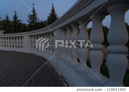 Concrete, vintage fencing with columns. Concrete Balusters. Fencing of the park 118631992