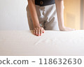 Women maid hands making a bed in hotel,Make a bed,Room service 118632630