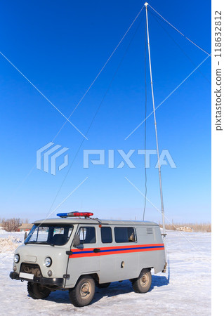 Resque car in work winter on blue sky Resque car in work winter on blue sky 118632812