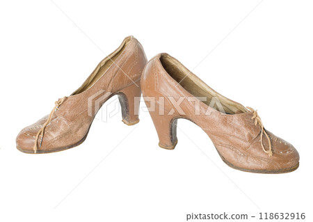 Old vintage traditional woman's shoes isolated with clipping path. Old vintage traditional woman's shoes isolated with clipping path. 118632916