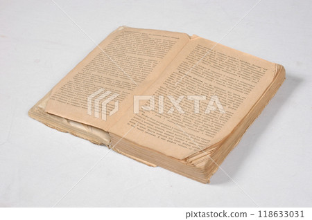 Old antique vintage open book on white 118633031