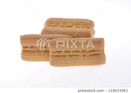 Tasty cookie and cakes isolated on white background Tasty cookie and cakes isolated on white background 118633061