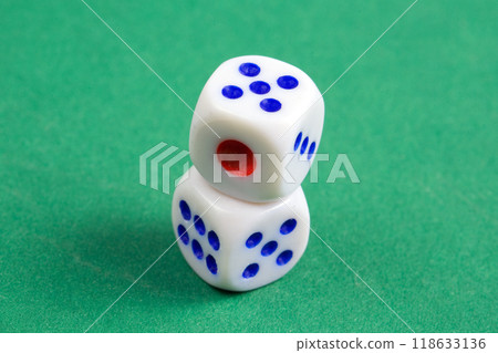 Two dice on a gaming table with space for text Two dice on a gaming table with space for text 118633136