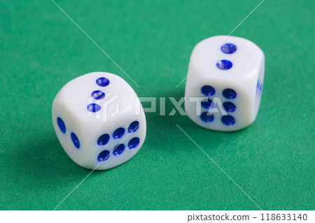 Two dice on a gaming table with space for text 118633140
