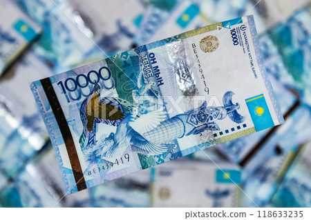 Thick wad of money cash on table Thick wad of money cash on table 118633235