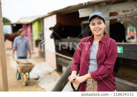 european female working on a farm 118634131