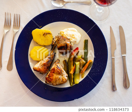 Portion of just cooked rabbit with vegetables Portion of just cooked rabbit with vegetables 118634373