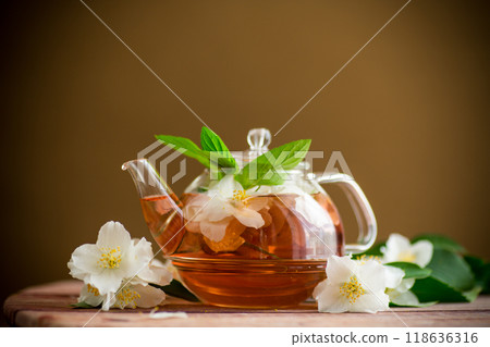 jasmine flower tea in a glass teapot jasmine flower tea in a glass teapot 118636316