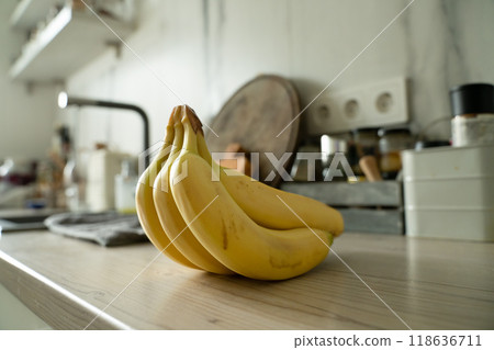 Bunch of bananas lying on the wooden background 118636711