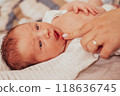 The examination of newborn baby mouth, frenulum of the tongue 118636745
