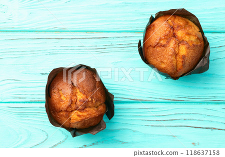 Sweet Baked vanilla muffins ( cupcake ) . Top view Sweet Baked vanilla muffins ( cupcake ) . Top view 118637158