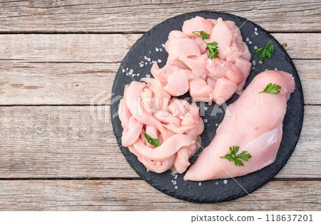 Raw chicken meat fillet ( breast ) Various of cutting in form slice and cube Raw chicken meat fillet ( breast ) Various of cutting in form slice and cube 118637201