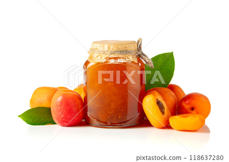 Apricot jam in glass jar and fresh fruits isolated on white. 118637280