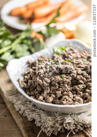 Boiled gnocchi from chicken or beef liver prepared in beef broth 118637337