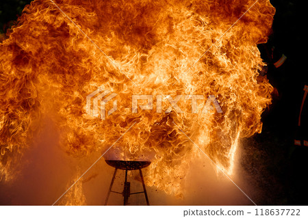 Intense Fire Explosion. An intense fire explosion captured in detail, revealing the ferocity and motion of the flame 118637722