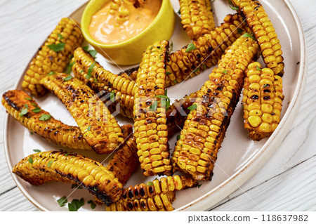 bbq corn ribs on a plate, top view 118637982