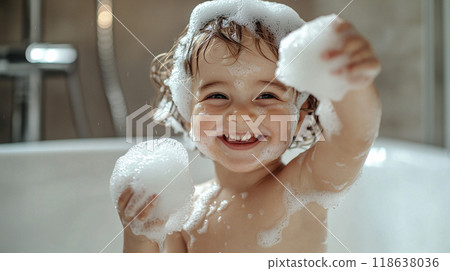 Bubble Bath Joy. A child enjoying a playful bubble bath 118638036