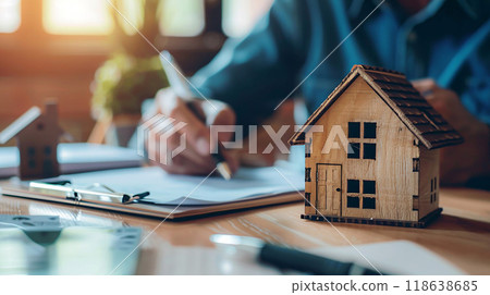 Legal consultation session, lawyer and clients discussing house purchase contract, 118638685