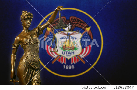 Lady Justice before a flag of Utah 118638847