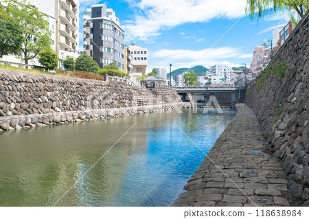The Nakajima River seen from the riverside of Meganebashi Bridge in Nagasaki towards Uoichibashi Bridge 118638984