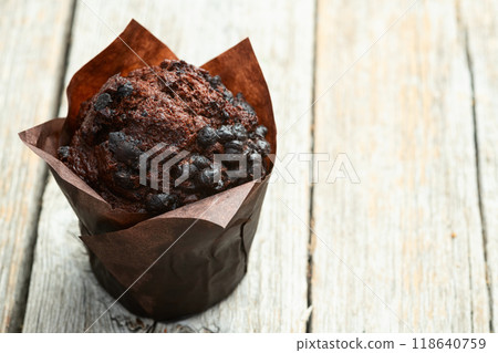 Sweet Baked chocolate muffins ( cupcake ) . Top view Sweet Baked chocolate muffins ( cupcake ) . Top view 118640759