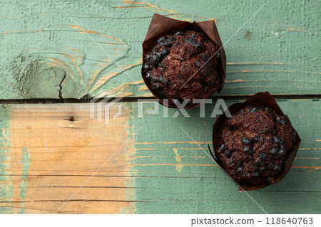 Sweet Baked chocolate muffins ( cupcake ) . Top view Sweet Baked chocolate muffins ( cupcake ) . Top view 118640763
