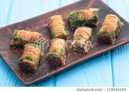 Traditional Turkish dessert baklava with walnut Traditional Turkish dessert baklava with walnut 118642048