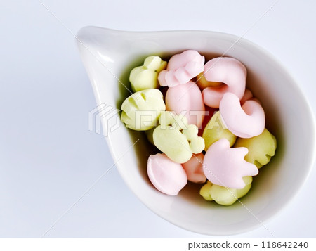 Colorful gummy bears in the shape of animal paw prints Colorful gummy bears in the shape of animal paw prints 118642240
