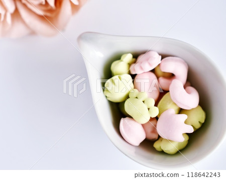 Colorful gummy bears in the shape of animal paw prints Colorful gummy bears in the shape of animal paw prints 118642243