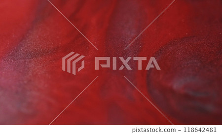 Ink liquid. Sparkling emulsion. Abstract red color mix flow glow shiny particles wave creative texture art fluid background. 118642481