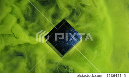 Steam flow. Ink water. Green acid neon color occult smoke curve wave wrapping shiny black cosmic cube form abstract background free space. Steam flow. Ink water. Green acid neon color occult smoke curve wave wrapping shiny black cosmic cube form abstract background free space. 118643143