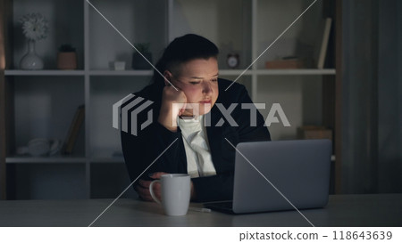 Late work. Job stress. Fatigued bored business woman employee falling asleep at workspace office during routine night shift with emotional burnout. 118643639
