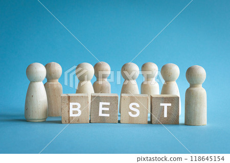 Figurines in front of toy blocks, with word Best. Figurines in front of toy blocks, with word Best. 118645154