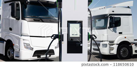 Electric vehicles charging station on a background of a trucks. Concept Electric vehicles charging station on a background of a trucks. Concept 118650610