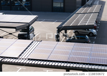 Parking space with solar panels on a roof 118650672