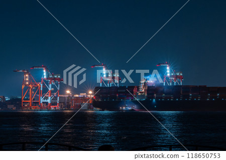 Container ship, cranes, shipping, night port scene 118650753