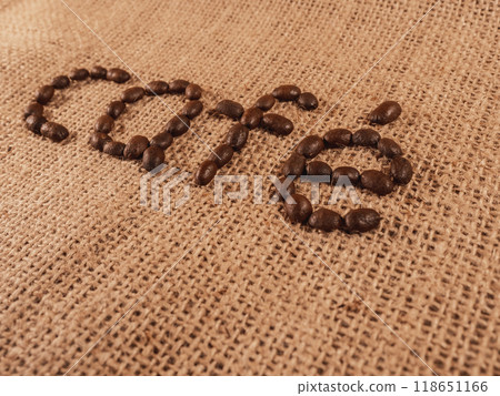 Coffee beans spell out the word cafe Coffee beans spell out the word cafe 118651166