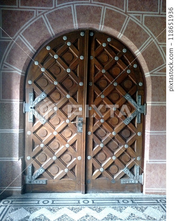 Doors in the castle church old door antique arched medieval concept material wood metal stone wall vertical 118651936