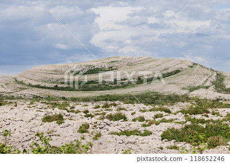 The Burren Ireland unique geological formations sparse vegetation rock layers form striking patterns 118652246