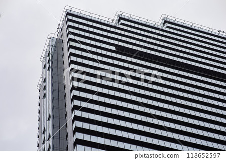 Modern office building. Architectural detail of modern building. Business concept of successful industrial architecture. Modern office building. Architectural detail of modern building. Business concept of successful industrial architecture. 118652597