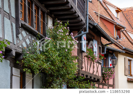 Old half-timbered houses in the historic medieval old town of Eguisheim in Alsace and on Alsace Wine Route, Haut-Rhin, Grand Est, France, Europe Old half-timbered houses in the historic medieval old town of Eguisheim in Alsace and on Alsace Wine Route, Haut-Rhin, Grand Est, France, Europe 118653298