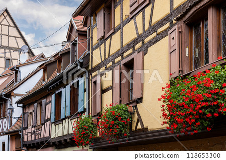 Old half-timbered houses in the historic medieval old town of Eguisheim in Alsace and on Alsace Wine Route, Haut-Rhin, Grand Est, France, Europe Old half-timbered houses in the historic medieval old town of Eguisheim in Alsace and on Alsace Wine Route, Haut-Rhin, Grand Est, France, Europe 118653300